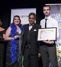 Karen Geary (left) and Operations Manager Jason Arnall (right), receiving the IFAP/CGU 2014 Safe Way Gold Achiever